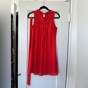 Coral sheath dress with matching belt
